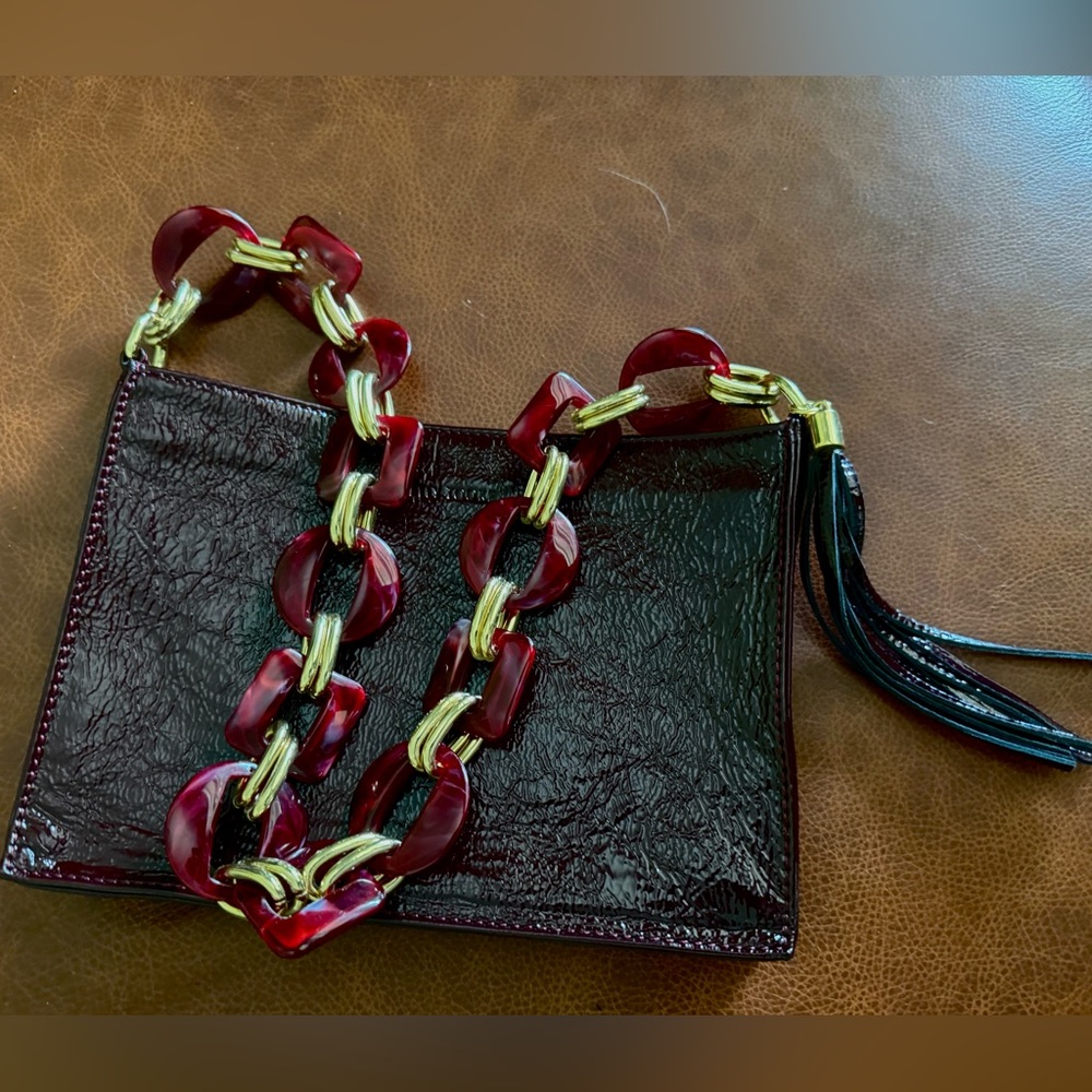 NWOT! Patent crinkle leather bag with decorative acrylic strap from Kelly Tooke